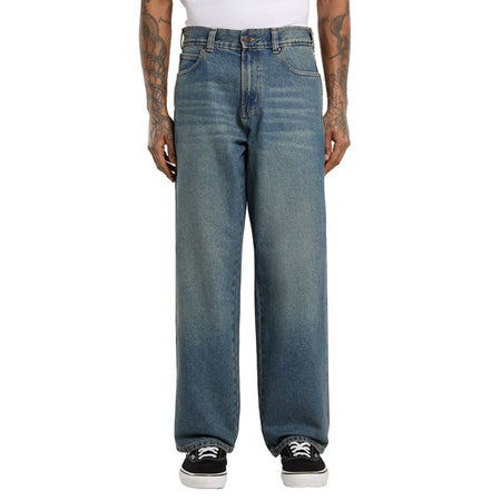 The Dickies Baggy work jeans are a baggy fit; tapered leg denim jeans. Made with durable and comfortable 14oz slub cotton denim twill; these jeans feature fivepocket set up; zip fly and shank button closure; phone / tool right hand side welt pocket; and back patch pockets with woven Dickies label. A modern block built with Dickies DNA. Baggy fit with tapered leg 100% cotton