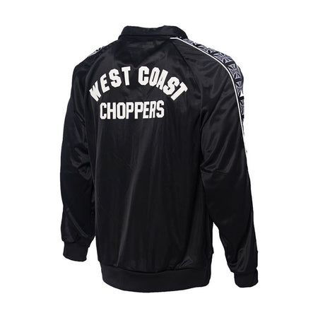 Slim fit tracksuit in brushed tricot; made from 100% polyester; with ribbed cuffs; nylon full zip in front; two front pockets; waistband with elastic inside and drawcord on pants.  Features the West Coast Choppers logo tape in jacquard with piping applied on sleeves and on sides of pants and printed logo's on chest and back.