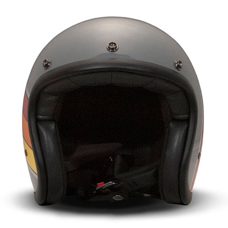 Embrace the fusion of classic style and modern functionality with the DMD Retro helmet; a nod to the iconic 70''s design. This helmet isn''t just a protective gear but a statement piece; crafted for those who dare to stand out. With its ECE 22.06 approved fiberglass shell available in three sizes; it offers a snug fit. The helmet is bluetooth ready; features integrated snaps for visors; and boasts a luxurious; washable lining with Velcro for a custom fit. Secured with a padded chin strap and a reliable Doub