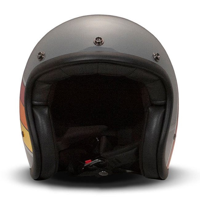 Embrace the fusion of classic style and modern functionality with the DMD Retro helmet; a nod to the iconic 70''s design. This helmet isn''t just a protective gear but a statement piece; crafted for those who dare to stand out. With its ECE 22.06 approved fiberglass shell available in three sizes; it offers a snug fit. The helmet is bluetooth ready; features integrated snaps for visors; and boasts a luxurious; washable lining with Velcro for a custom fit. Secured with a padded chin strap and a reliable Doub