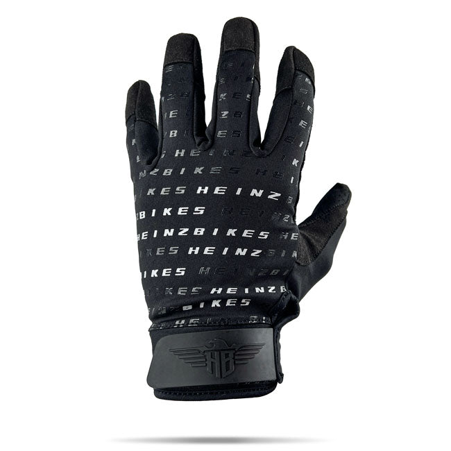 The HeinzBikes Pattern gloves deliver more than just good looks. Built with breathable; durable materials; they keep your hands cool; dry; and ready for the ride. Enjoy max comfort with 4-way stretch fabric; vibration-dampening padding; and reinforced palms for solid grip. Stay connected with touchscreen-friendly synthetic leather and get them on in seconds with the pull-on loop. The Pattern gloves are built to ride; designed to stand out.