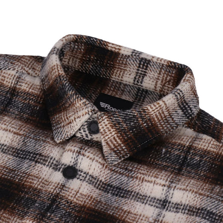 The Roeg Blaze Shirt is built for action and style; this shirt transitions seamlessly from job site to date night. Crafted from 100% heavyweight cotton; it offers rugged durability with breathable comfort. Thoughtfully tailored for a roomy fit; it features single- and double-needle polyester stitching for lasting wear. Rugged stainless-steel snaps to add a touch of flair. Available in several colorways.