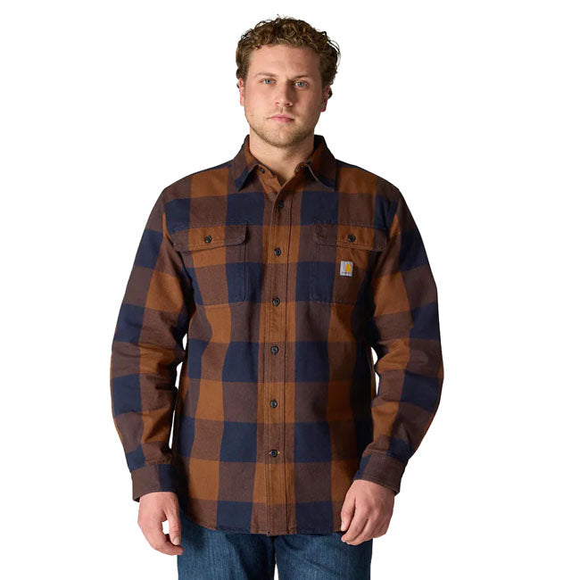 A Carhartt Heavyweight flannel built for cold days. This brushed cotton shirt offers a loose fit; dual chest pockets (one with a pencil slot); and triple-stitched seams for added strength. Garment-washed for softness and reduced shrinkage-ready for work or weekends. Loose Fit Two-piece stand collar Two pleats along back yoke seam for ease of movement Two chest pockets with flaps and button closure and left chest pocket with pencil opening Button front closure Two-button adjustable cuffs with extended 