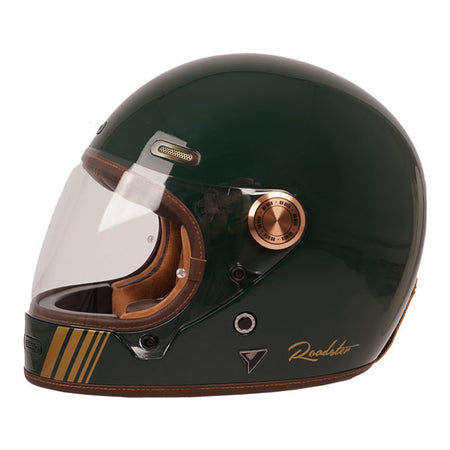The By City Roadster III helmet blends timeless design with advanced safety. Crafted from fiberglass; it offers durability and a lightweight feel. The leather-finished; removable; and washable multi-density padding ensures maximum comfort; while ventilation inlets and a rear fastening system provide added functionality. The injected visor; anti-fog ready with by laminate; guarantees clear vision in any weather. A double buckle closure ensures a secure fit; and it's Bluetooth system ready for seamless connec