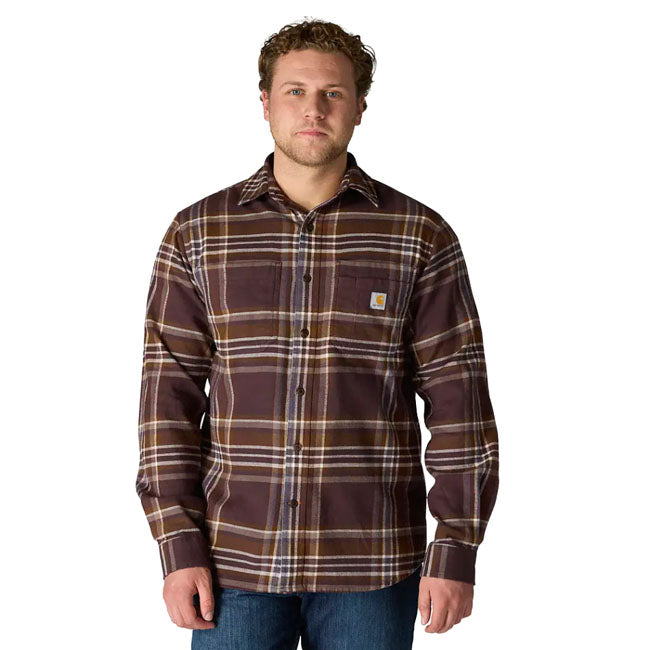 Stretch flannel comfort with room to move. This Carhartt Flannel midweight plaid shirt combines soft; garment-washed cotton with Rugged FlexT stretch for added mobility. Built with triple-stitched seams; adjustable cuffs; and chest pockets; one with a pencil slot; for reliable everyday wear. Relaxed Fit Rugged FlexT - Allows for more movement Two-piece stand collar Two chest pockets: left chest pocket with pencil opening and additional panel for added storage Button front closure Two-button adjustable