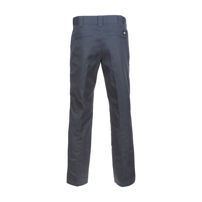 The Dickies 872 Work pants is a modern take on a classic heritage chino with a slim tapered fit that sits at the waist. Constructed in the 66 cloth; 65% polyester 35% cotton; now produced of consciously sourced recycled fibres for comfort and ease of movement. This wrinkle resistant chino is offered ina wide range of fade resistant colors. A slimmer work inspired pants designed to look smart with durability at its core.