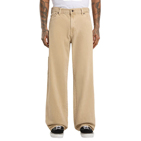 The Dickies 1993 Loose straight carpenter jeans are a loose fit; straight leg denim jeans. Made with a sturdy 14oz slub denim cotton twill for comfort and durability; these jeans feature rounded front pockets; zip fly and shank button closure; patched back pocket; hammer loop; ruler and tool pocket; and woven Dickies label on back patch pocket. Durable and ready to move; these are an anywhere and everywhere denim jeans. Loose fit with tapered leg 100% cotton