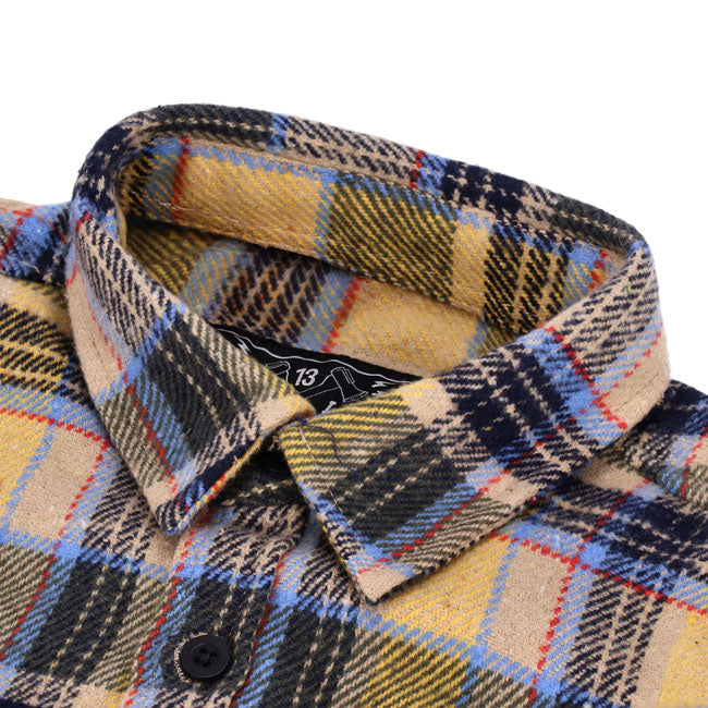 The 13 1/2 Steel Flannel Shirt is built for action and style; this shirt transitions seamlessly from job site to date night. Crafted from 100% heavyweight cotton; it offers rugged durability with breathable comfort. Thoughtfully tailored for a roomy fit; it features single- and double-needle polyester stitching for lasting wear. Rugged stainless-steel snaps to add a touch of flair. Available in several colorways.