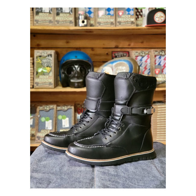 The Holy Freedom Night Hawk Boots combine rugged durability and bold style; featuring regenerated leather uppers; a grippy rubber sole; and internal ankle protection. Designed for motorcycle racing and tough conditions; they offer a secure fit with a technical side tension strap; two-position steel buckle; and adjustable calf closure. CE-approved for safety; these boots deliver unmatched performance; comfort; and control on any ride.