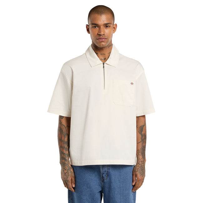 The Dickies Cadiz QZ shirt is a boxy fit quarter zip shirt. Made out of wrinkle and stain resistant 4.6oz poly-cotton twill; features include chest pocket with woven Dickies label; and quarter zip closure. A comfortable and casual piece perfect for Spring and Summer.  Boxy fit 65% polyester / 35% cotton 4.6oz poly-cotton twill