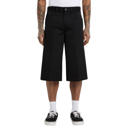 The Dickies Union 17 Inch loose short is an extra loose baggy fit short. With a slight A-line; these shorts are made with wrinkle and stain resistant 8.3oz polycottonblend with a soft hand feel. Features include metal branded shank buttons; rounded back patch pockets; rounded front pockets; clean front crease; 1'' fold backhem; and woven Dickies label on the back pocket. These shorts are durable and comfortable; with a baggy fit for ease of movement. Extra loose fit 65% polyester / 35% cotton