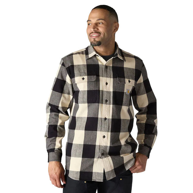 A Carhartt Heavyweight flannel built for cold days. This brushed cotton shirt offers a loose fit; dual chest pockets (one with a pencil slot); and triple-stitched seams for added strength. Garment-washed for softness and reduced shrinkage-ready for work or weekends. Loose Fit Two-piece stand collar Two pleats along back yoke seam for ease of movement Two chest pockets with flaps and button closure and left chest pocket with pencil opening Button front closure Two-button adjustable cuffs with extended 