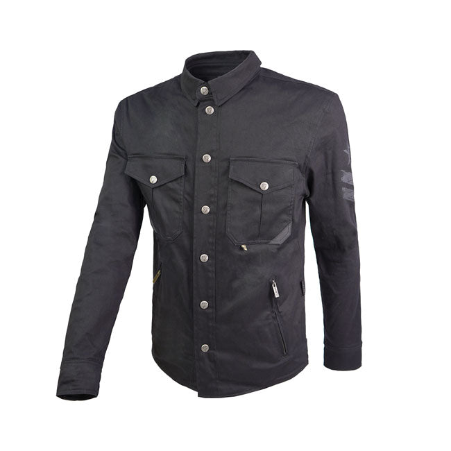 This By City SUV overshirt is a real revolution in biker fashion. Providing great security and comfort. Its inner Aramid lining gives it the resistance for the most demanding and its outer denim fabric allows it to be used as an urban shirt. It incorporates reflective camouflage on the elbows for night driving. Features 2 outer and inner pockets; hook system on the belt for "Safeway"; adjustable wrist and collar; double YKKr central zipper; back protector pocket (not included) and "Flexishock" protections o
