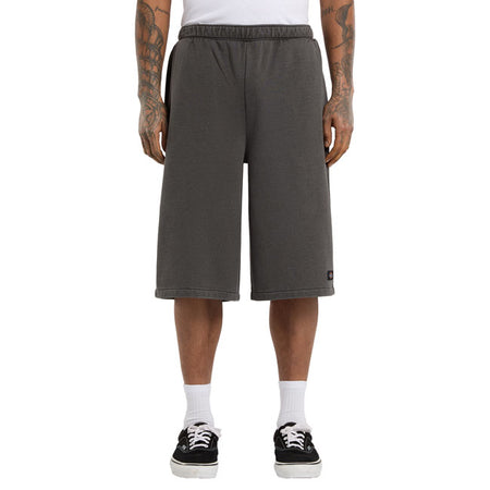 The Dickies Streetsboro 13 Inch sweat short is a loose fitting with slight A-line athletic shorts. Made out of garment dyed ring spun french terry poly-cotton; theseshorts feature elasticated waist; angled front pockets; back welt pocket; and dyed to-match labels above hem and on back pocket. The perfect active shorts for the warmer seasons. Loose fit 60% cotton / 40% polyester