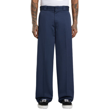 The Dickies 247 Loose work pant is a loose fit; straight leg twill work pant. Made with 8.3OZ 100% cotton with enzyme wash for softening. Featuring work pant welt back pockets; front slash pockets; front and back crease; zip-fly with top button closure; and contrast waistband tape and print. A modern take on classic workwear. Available in a wide range of classic and seasonal fade resistant colors. Loose fit with straight leg 100% cotton twill
