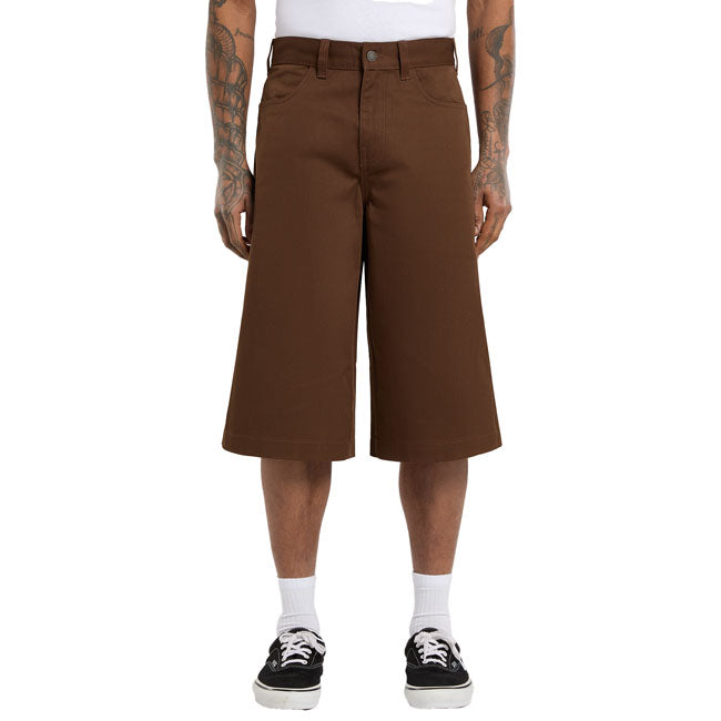 The Dickies Union 17 Inch loose short is an extra loose baggy fit short. With a slight A-line; these shorts are made with wrinkle and stain resistant 8.3oz polycottonblend with a soft hand feel. Features include metal branded shank buttons; rounded back patch pockets; rounded front pockets; clean front crease; 1'' fold backhem; and woven Dickies label on the back pocket. These shorts are durable and comfortable; with a baggy fit for ease of movement. Extra loose fit 65% polyester / 35% cotton