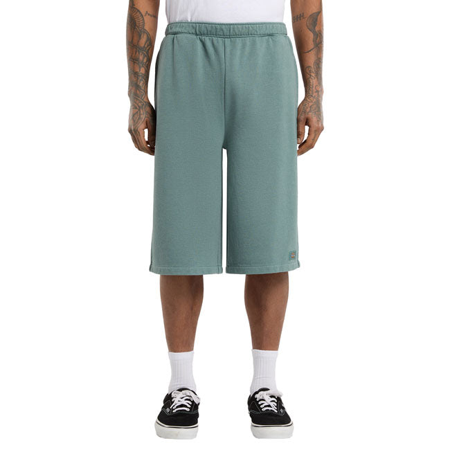 The Dickies Streetsboro 13 Inch sweat short is a loose fitting with slight A-line athletic shorts. Made out of garment dyed ring spun french terry poly-cotton; theseshorts feature elasticated waist; angled front pockets; back welt pocket; and dyed to-match labels above hem and on back pocket. The perfect active shorts for the warmer seasons. Loose fit 60% cotton / 40% polyester