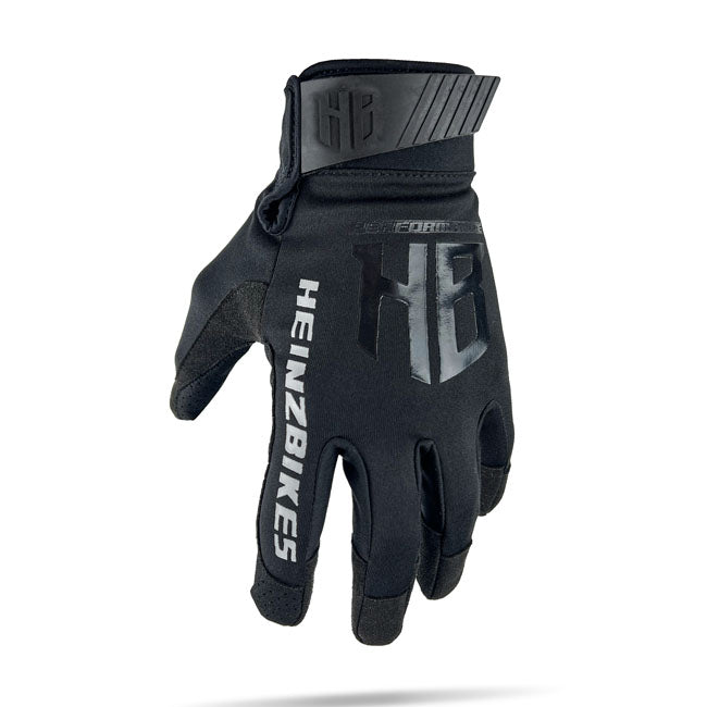 The HB gloves from HeinzBikes are built for riders who demand comfort and performance. With breathable; durable materials and 4-way stretch fabric; they offer maximum dexterity and a secure; tailored fit. Palm reinforcement boosts your grip; while padding absorbs vibrations for all-day comfort. Stay connected with touchscreen-friendly synthetic leather and get ready fast with the handy pull-on loop.