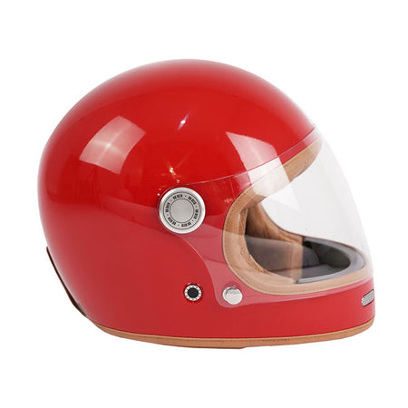 The By City Roadster II helmet; compact and refined design; comfortable; functional; and safe. It has been designed for those looking for a classic aesthetic and made of fiberglass. Leather interior and finish; with easy-to-use double ring fastening system for a perfect fit. Features removable; multi-density and washable interior padding; ventilation inlets and rear fastening for attaching goggles. Injected visor ensures clear vision in all weather conditions. The Roadster II helmet is ECE/UN R.22.06 approv