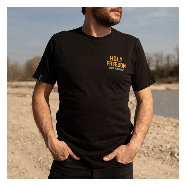 The Holy Freedom Tiger t-shirt is a step into the world of adventure. Made from 100% slub cotton (160 gr); this short-sleeved; crew-neck tee features a bold heart print on the front and an eye-catching back design. The t-shirt has a tight fit so for a more comfortable fit; we recommend ordering one size up. Enjoy style and freedom with the Holy Freedom Tiger t-shirt.