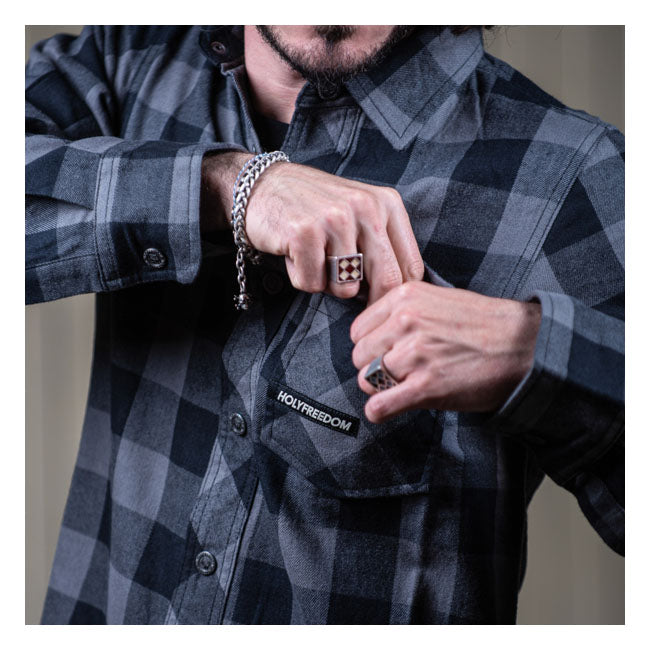The Jessie James flannel shirt channels classic Americana with a Holy Freedom twist. Crafted from 100% cotton flannel; it features contrast side stitching and heart-shaped chest pockets that nod to vintage workwear with a rebellious edge. Personalized snap buttons and a back patch bearing the HolyFreedomr mark tie it all together; delivering timeless style with roots in the road. A regular fit keeps it comfortable; built for long rides; worn-in stories; and everyday grit.