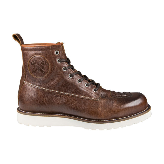 Craftily disguised as a classical leather boot; the Joh Doe Iron XTMr is actually a motorcycle boot that meets the toughest safety standards. John Doe made sure of this with a membrane in XTM-Fiberr giving you additional ankle; heel and forefoot reinforcement. Leather shift protection gives you additional grip while shifting through the gears. The tongue is fitted with a barrier to keep water from washing into the boot. As you'd expect; Iron XTMr has a oil-resistant and vibration-absorbing non-slip sole. C