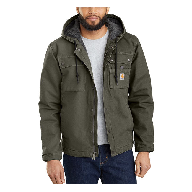 This Carhartt jacket is built to endure cold; wind and tough days on the job. Rugged without being rigid; made with durable cotton duck. This warm layer is lined with soft sherpa fleece through the body and hood; with warm quilted nylon through the sleeves. Relaxed Fit Wind FighterT Wind resistant Attached three-piece hood with low profile adjustment at hood hem Two chest pockets with flaps and snap closure Two lower front pockets Two interior pockets; one pocket with zipper closure and one with hook-