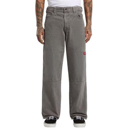 The Dickies Double Knee loose straight Jeans are a loose fit straight legged jeans. Made out of 14oz slub cotton denim twill for durability and comfort; these 5 pocket set up jeans feature double knee detail with woven Dickies label; zip fly and shank button closure; back patch pockets with woven Dickies label; right hand side phone / tool welt pocket; and metal rivet reinforcements. Heavy duty and ready for work; these hardwearing jeans will stand the test of time. Loose fit with straight leg 100% cotton
