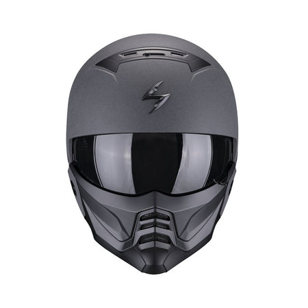 True Bad-ass is back! Loved by celebrities. The new EXO-Combat II; ECE R22.06 approved; is back with an even more aggressive design and radical look! Improved fitment; enhanced noise-reduction and an optically improved sun visor are just a few of the improvements over the previous EXO-Combat Helmet. The new 2-piece design allows the rider maximum airflow by converting to an open-face style helmet when needed. Attach the mask to complete the aggressive `bad-ass' look or just to add a little protection from d