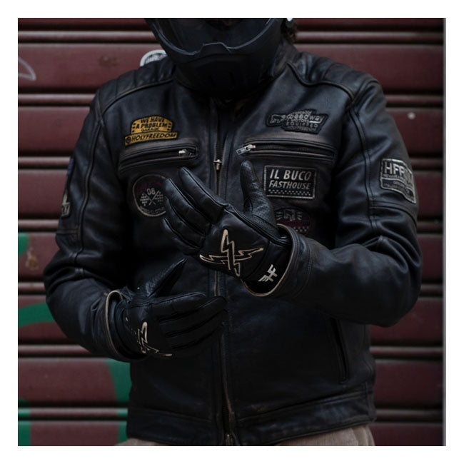 The Holy Freedom glove is a nice cafe racer style glove with improved fitting; padded comfort liner; perforation for cooling and velcro closure strap with micro injection logo and a new logo on the wrist. It is made from full grain vintage waxed leather with internal contoured reinforcements for knuckles and fingers. The glove has a CE EN13594 homologation. This is a specialised standard for assessing the level of protection provided by a glove during a potential accident while motorcycle riding.