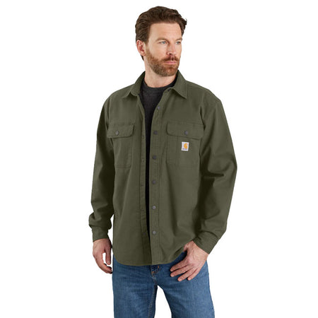 This Carhartt shirt jacket is warm enough to wear as a jacket on cooler days. It''s made of canvas with built-in flex to give you the range of motion you need on the job. A soft fleece lining defends against the cold. The relaxed-fit layer comes equipped with handwarmer pockets and two snap pockets for your wallet or keys. 8.5-ounce; 98% cotton / 2% spandex stretch canvas Fleece lining for warmth Built to move with Rugged Flexr stretch technology Spread collar Metallic Carhartt logo snaps throughout T