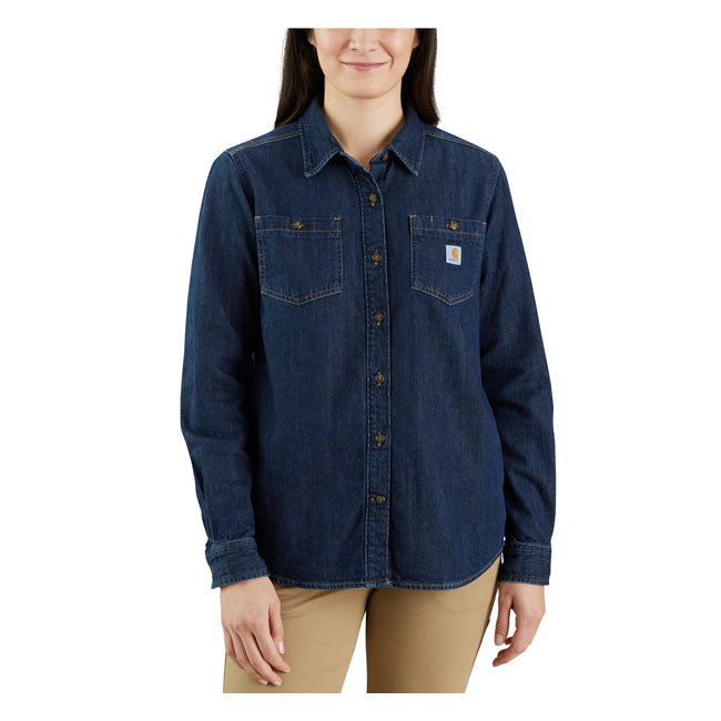 Wear this Carhartt denim shirt to work or save it for the weekend. Either way; the soft midweight cotton denim is comfortable as well as durable. It has a relaxed fit so you can layer it over a t-shirt when the sun goes down for little bit of extra warmth. Relaxed Fit Two-piece stand collar Two chest pockets with button closure and left chest pocket with pencil opening Two lower front welt pockets Button front closure Two-button adjustable cuffs with extended plackets Drop tail hem Carhartt label se