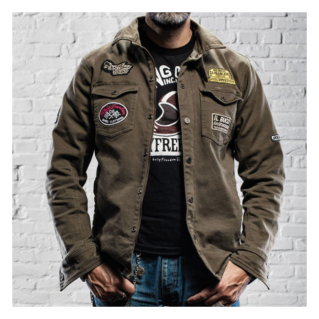 Military green with patches is Holy Freedom''s proposal for an item like the Liutannent jacket with a very high passive safety content to travel protected by motorbike when the climate is not too harsh.  Very comfortable to wear thanks to the outer fabric in stretch twill. Features a lined Kevlar interior against abrasion; pockets for removable back protectors; shoulder and elbows protectors and a double front closure with zip and personalized snaps buttons. The jacket is a full CE certified jacket.