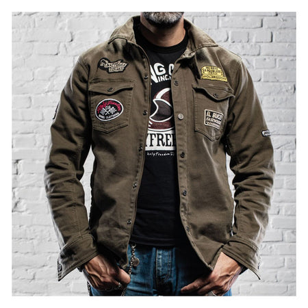 Military green with patches is Holy Freedom''s proposal for an item like the Liutannent jacket with a very high passive safety content to travel protected by motorbike when the climate is not too harsh.  Very comfortable to wear thanks to the outer fabric in stretch twill. Features a lined Kevlar interior against abrasion; pockets for removable back protectors; shoulder and elbows protectors and a double front closure with zip and personalized snaps buttons. The jacket is a full CE certified jacket.