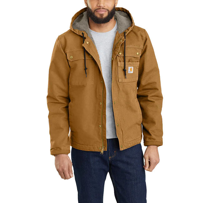 This Carhartt Bartlett jacket is built to endure cold; wind and tough days on the job. Rugged without being rigid; made with durable cotton duck. This warm layer is lined with soft sherpa fleece through the body and hood; with warm quilted nylon through the sleeves. Relaxed Fit Wind FighterT - Wind resistant Attached three-piece hood with low profile adjustment at hood hem Two chest pockets with flaps and snap closure Two lower front pockets Two interior pockets; one pocket with zipper closure and one