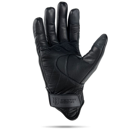 Designed for riders who value both style and safety; the HeinzBikes Clubstyle gloves feature a pre-curved finger design for a natural; comfortable grip. Flexible TPU knuckle protectors sit discreetly under the leather; complemented by integrated padding on each finger for added defence. Reinforced palms improve grip; while padded areas absorb strong vibrations for all-day comfort. The short cuff with a low-profile adjustable Velcro closure ensures a secure; personalized fit. The Clubstyle gloves with the ti