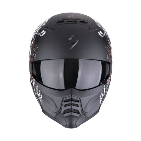 True Bad-ass is back! Loved by celebrities. The new EXO-Combat II; ECE R22.06 approved; is back with an even more aggressive design and radical look! Improved fitment; enhanced noise-reduction and an optically improved sun visor are just a few of the improvements over the previous EXO-Combat Helmet. The new 2-piece design allows the rider maximum airflow by converting to an open-face style helmet when needed. Attach the mask to complete the aggressive `bad-ass' look or just to add a little protection from d