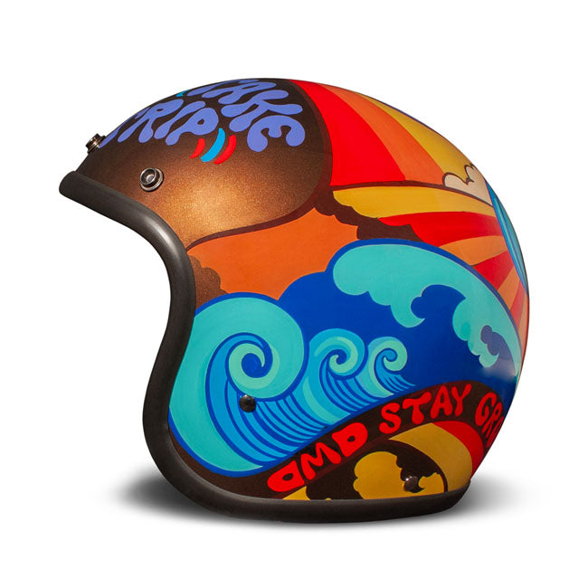 Embrace the fusion of classic style and modern functionality with the DMD Retro helmet; a nod to the iconic 70''s design. This helmet isn''t just a protective gear but a statement piece; crafted for those who dare to stand out. With its ECE 22.06 approved fiberglass shell available in three sizes; it offers a snug fit. The helmet is bluetooth ready; features integrated snaps for visors; and boasts a luxurious; washable lining with Velcro for a custom fit. Secured with a padded chin strap and a reliable Doub