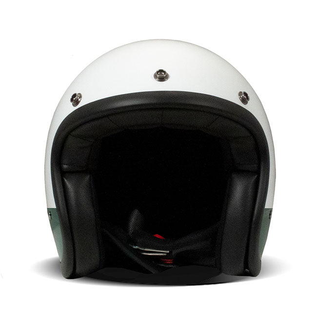Embrace the fusion of classic style and modern functionality with the DMD Retro helmet; a nod to the iconic 70''s design. This helmet isn''t just a protective gear but a statement piece; crafted for those who dare to stand out. With its ECE 22.06 approved fiberglass shell available in three sizes; it offers a snug fit. The helmet is bluetooth ready; features integrated snaps for visors; and boasts a luxurious; washable lining with Velcro for a custom fit. Secured with a padded chin strap and a reliable Doub