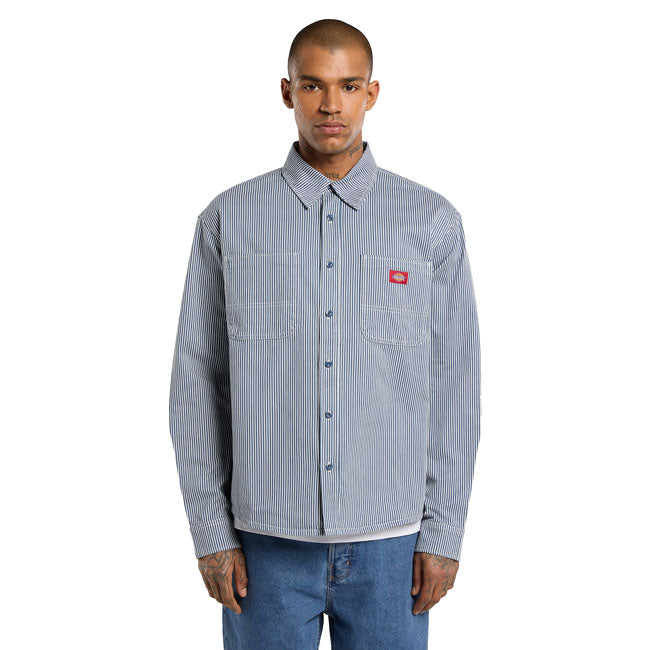The Dickies Hickory work shirt is a relaxed fit long sleeve button-up shirt with authentic Dickies detailing and fabrication. Made out of 7oz garment washed hickory cotton twill; this work shirt features two-piece collar; front rounded patch pockets; woven Dickies label on left chest pocket; and button-up closure with placket. A light and versatile; comfort driven hickory shirt. Relaxed fit 100% cotton 7oz garment washed hickory cotton