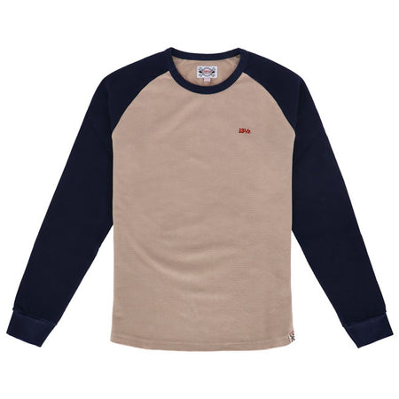 If you love the vintage look of the old-school motorcycle-club sweaters; you''ll love this 13 « Waffle shirt long sleeve. This shirt is made of 100% cotton and has a textured waffle knit that adds warmth and style. The round neck and the ribbed cuffs and hem give it a classic fit and feel. Available in three colorways.