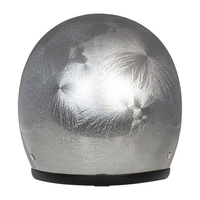 Embrace the fusion of classic style and modern functionality with the DMD Retro helmet; a nod to the iconic 70''s design. This helmet isn''t just a protective gear but a statement piece; crafted for those who dare to stand out. With its ECE 22.06 approved fiberglass shell available in three sizes; it offers a snug fit. The helmet is bluetooth ready; features integrated snaps for visors; and boasts a luxurious; washable lining with Velcro for a custom fit. Secured with a padded chin strap and a reliable Doub