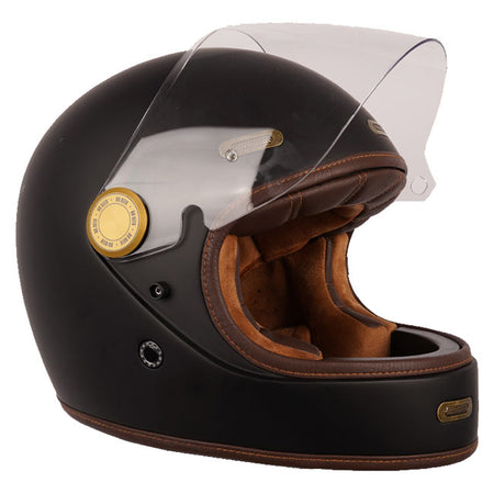 The By City Roadster III helmet blends timeless design with advanced safety. Crafted from fiberglass; it offers durability and a lightweight feel. The leather-finished; removable; and washable multi-density padding ensures maximum comfort; while ventilation inlets and a rear fastening system provide added functionality. The injected visor; anti-fog ready with by laminate; guarantees clear vision in any weather. A double buckle closure ensures a secure fit; and it's Bluetooth system ready for seamless connec