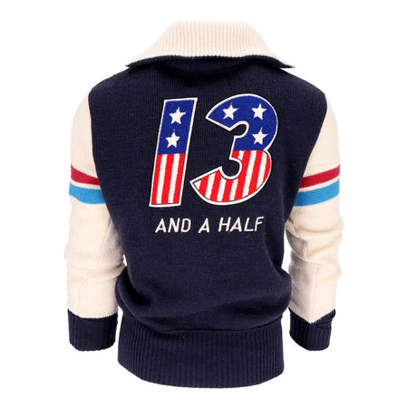 The Motordrome 100% wool Race Jersey is inspired by the race jerseys as worn by those who challenged death on the board tracks in the motordromes in the first 30 years of the 20th century.  This heavy wool jersey features chain-stitched text on the front and chenille text on the back for that distinctive vintage look.