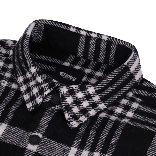 The Roeg Blaze Shirt is built for action and style; this shirt transitions seamlessly from job site to date night. Crafted from 100% heavyweight cotton; it offers rugged durability with breathable comfort. Thoughtfully tailored for a roomy fit; it features single- and double-needle polyester stitching for lasting wear. Rugged stainless-steel snaps to add a touch of flair. Available in several colorways.