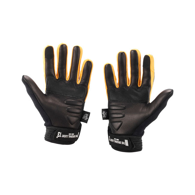 Strudy and high quality black/ yellow leather gloves. These gloves feature the iconic Lucky 13 Logo on the back of the gloves. 60% Genuine Leather; 30% Polyester Fourway Spandex; 5% Neoprene; 5% Pvc Rubber.